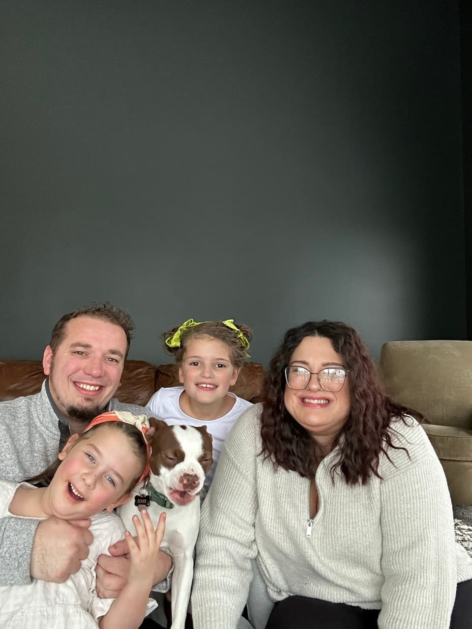 The Cobb family with their dog